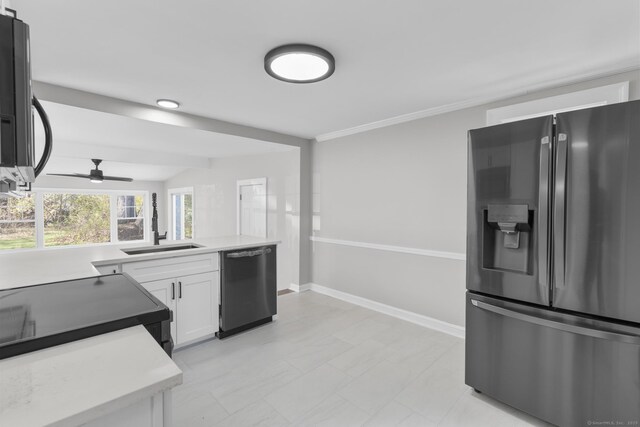 330 Meriden Ave, Southington, CT 06489 - kitchen featuring stainless steel appliances, a sink, white cabinets, and light countertops