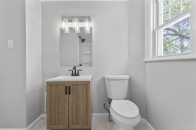 330 Meriden Ave, Southington, CT 06489 - half bath featuring toilet, vanity, and baseboards