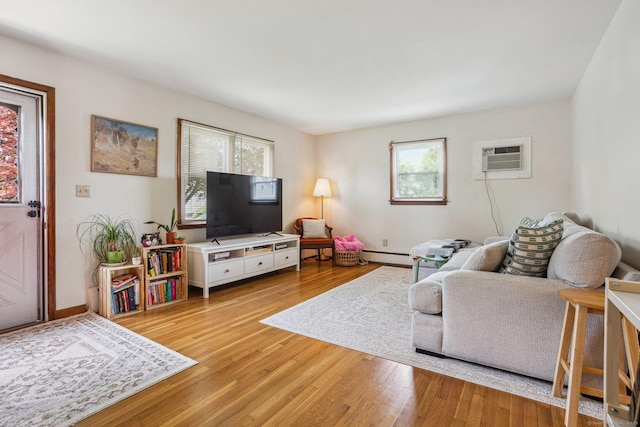 64 Willow St, Milford, CT 06460 - living area with light wood-style floors, baseboard heating, and baseboards