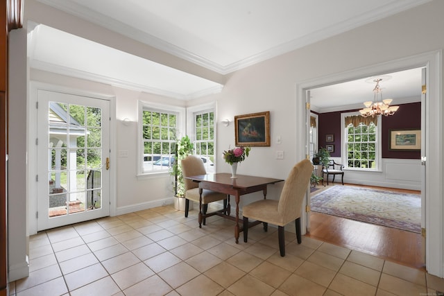52 Dug Rd, Glastonbury, CT 06073 - dining room featuring crown molding, a chandelier, light tile patterned floors, and baseboards