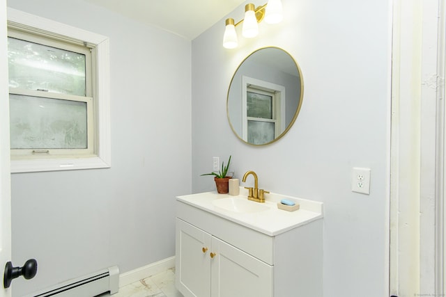 163 State Ave, Killingly, CT 06241 - bathroom featuring baseboard heating, marble finish floors, and vanity