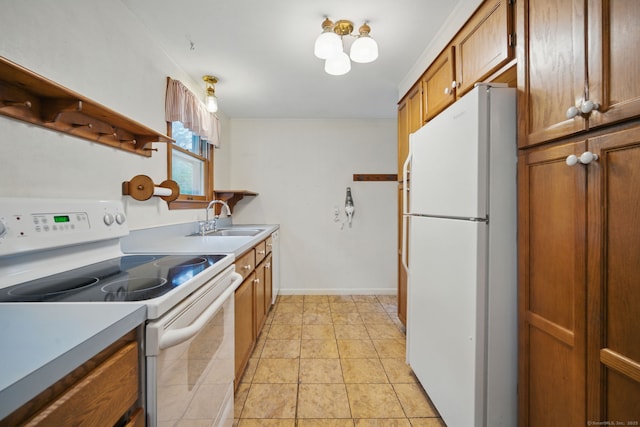 19 Litchfield Pl, Rocky Hill, CT 06067 - kitchen with white appliances, brown cabinets, and light countertops