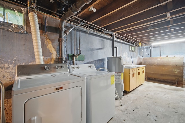 19 Litchfield Pl, Rocky Hill, CT 06067 - laundry area with oil tank, water heater, and washer and clothes dryer