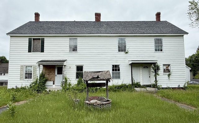 37 Aldrich Ave, Plainfield, CT 06354 - rear view of property featuring a chimney
