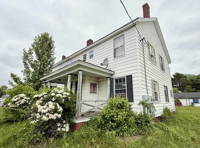 37 Aldrich Ave, Plainfield, CT 06354 - view of front of property with a chimney and covered porch