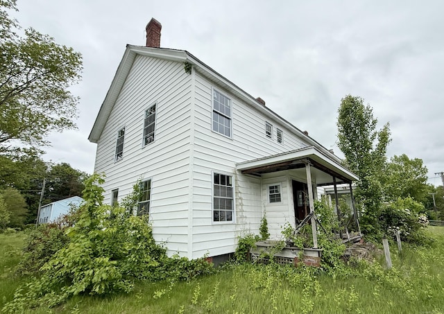 37 Aldrich Ave, Plainfield, CT 06354 - rear view of property with a chimney