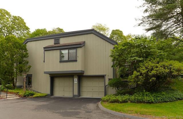 881 Heritage Vlg Unit B, Southbury, CT 06488 - view of front of home featuring driveway and an attached garage