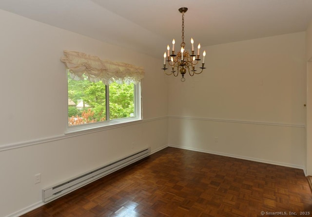 881 Heritage Vlg Unit B, Southbury, CT 06488 - unfurnished room with a baseboard radiator, a chandelier, and baseboards