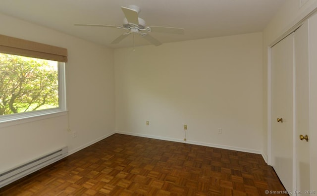 881 Heritage Vlg Unit B, Southbury, CT 06488 - spare room with a baseboard radiator, a ceiling fan, and baseboards