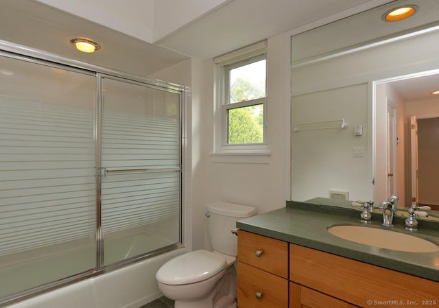 881 Heritage Vlg Unit B, Southbury, CT 06488 - bathroom with vanity, toilet, bath / shower combo with glass door, and recessed lighting