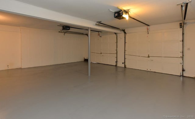 881 Heritage Vlg Unit B, Southbury, CT 06488 - garage featuring a garage door opener