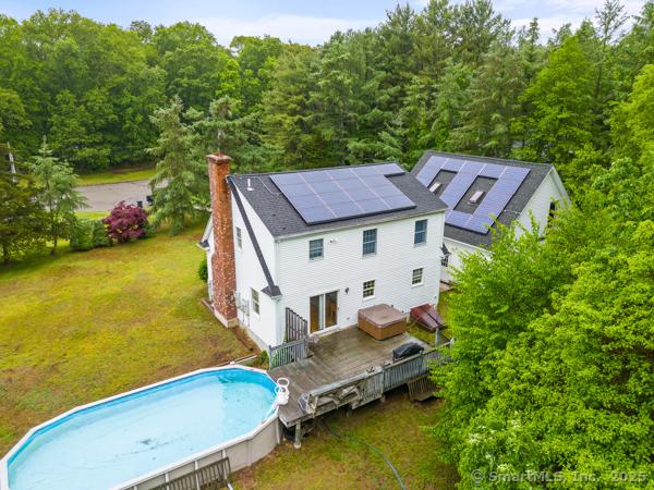 5 Conrad Ct, Ledyard, CT 06335 - view of subject property with a forest and a pool area