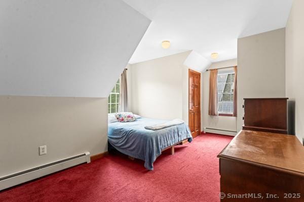 5 Conrad Ct, Ledyard, CT 06335 - bedroom featuring a baseboard heating unit, lofted ceiling, multiple windows, and carpet flooring