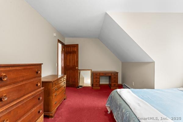 5 Conrad Ct, Ledyard, CT 06335 - bedroom with dark colored carpet, lofted ceiling, and baseboard heating