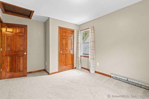 5 Conrad Ct, Ledyard, CT 06335 - unfurnished bedroom featuring carpet flooring, baseboards, and attic access