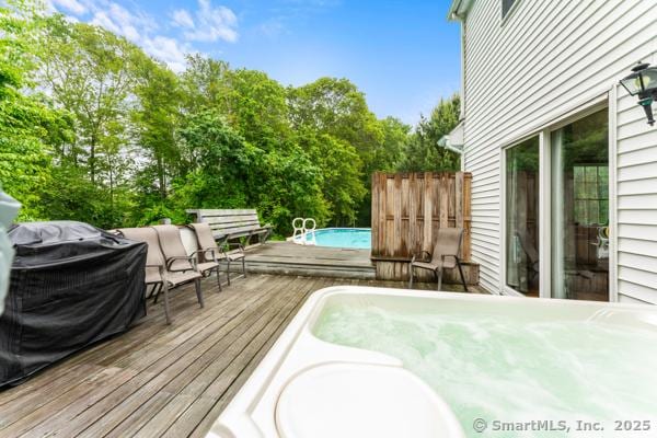 5 Conrad Ct, Ledyard, CT 06335 - deck featuring an outdoor pool and view of scattered trees