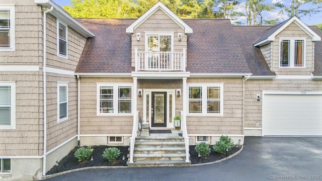 308 Old Zoar Rd, Monroe, CT 06468 - view of front of home featuring a balcony, asphalt driveway, a garage, and a shingled roof
