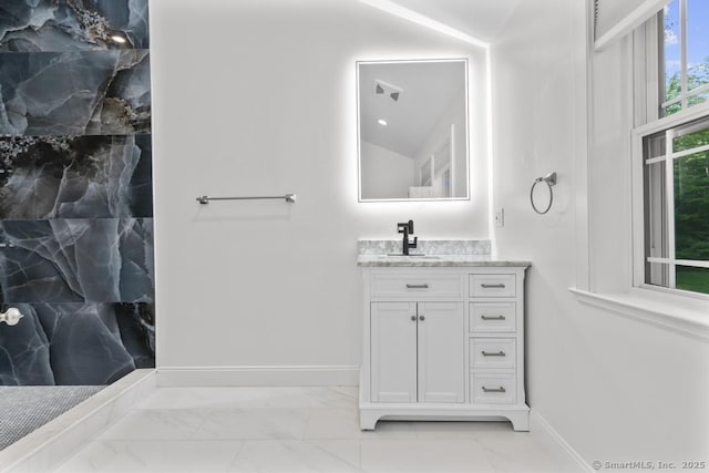 308 Old Zoar Rd, Monroe, CT 06468 - full bath with marble finish flooring, vanity, baseboards, and a marble finish shower