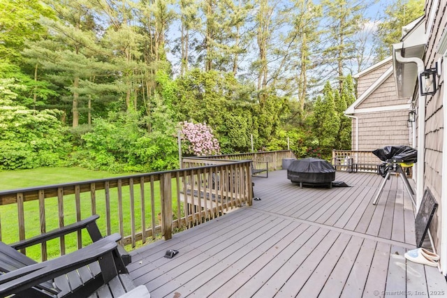 308 Old Zoar Rd, Monroe, CT 06468 - wooden deck featuring a lawn, grilling area, and view of wooded area