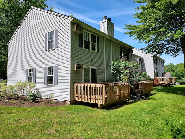 745 Merrow Rd Apt 171, Coventry, CT 06238 - rear view of property featuring a chimney, a wooden deck, and a yard
