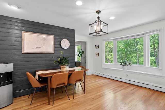 401 Russell Ave, Suffield, CT 06078 - dining area featuring baseboard heating, wood walls, a chandelier, light wood-style flooring, and recessed lighting