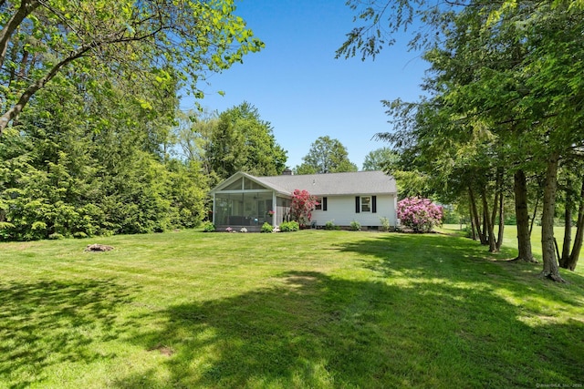401 Russell Ave, Suffield, CT 06078 - view of grassy yard with a sunroom