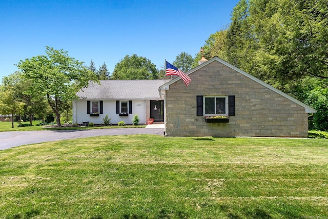 401 Russell Ave, Suffield, CT 06078 - ranch-style house with a front lawn, stone siding, and driveway