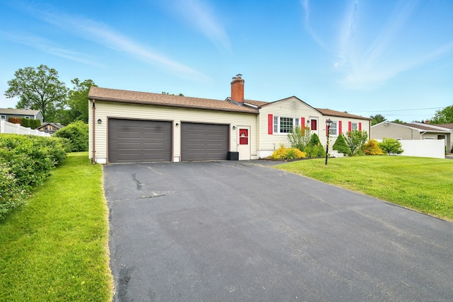 47 Varno Ln, Enfield, CT 06082 - ranch-style home with an attached garage, driveway, and a chimney