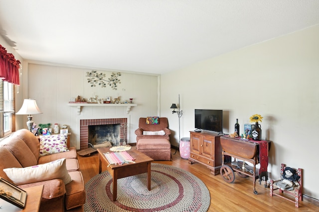 47 Varno Ln, Enfield, CT 06082 - living area with wood finished floors and a fireplace