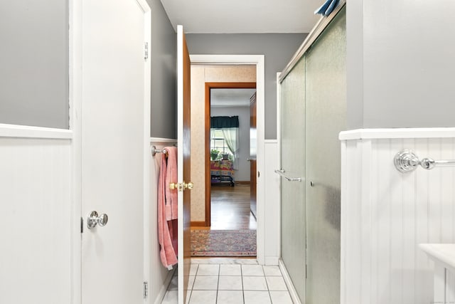 47 Varno Ln, Enfield, CT 06082 - bathroom with a shower stall, wainscoting, and tile patterned floors