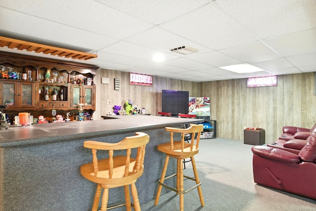 47 Varno Ln, Enfield, CT 06082 - bar with a drop ceiling, carpet flooring, and wood walls