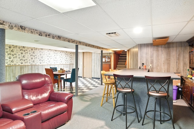 47 Varno Ln, Enfield, CT 06082 - indoor bar with wood walls, a drop ceiling, stairs, and tile patterned floors