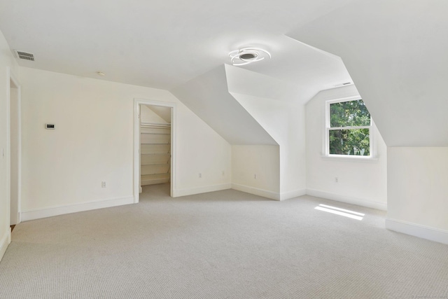 50 Harrison Ave, New Canaan, CT 06840 - bonus room with light carpet, baseboards, and vaulted ceiling