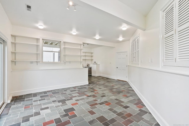 50 Harrison Ave, New Canaan, CT 06840 - kitchen with open shelves, baseboards, and a peninsula