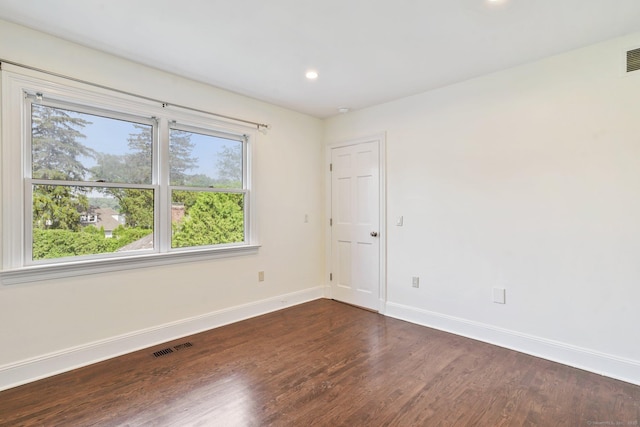 50 Harrison Ave, New Canaan, CT 06840 - spare room featuring healthy amount of natural light, baseboards, dark wood finished floors, and recessed lighting