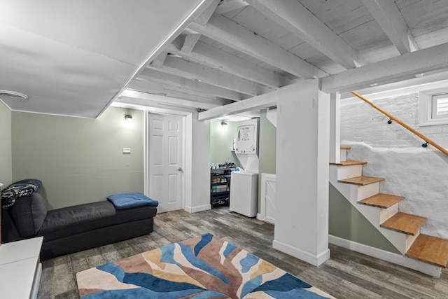 128 Mill River St, New Haven, CT 06511 - living room with wood finished floors, stairway, beam ceiling, and baseboards