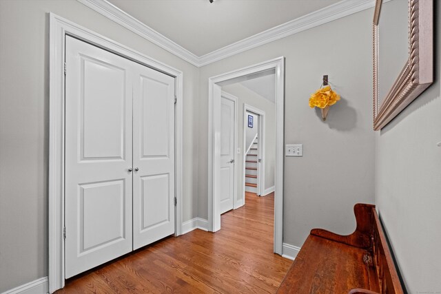 40 Thunder Hill Ln, Ridgefield, CT 06877 - hallway with baseboards, wood finished floors, ornamental molding, and stairs