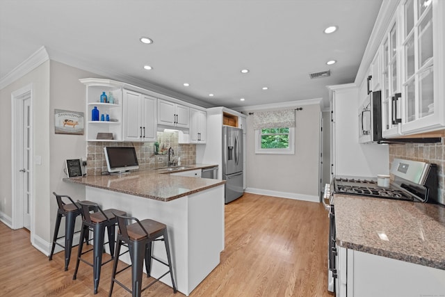 40 Thunder Hill Ln, Ridgefield, CT 06877 - kitchen featuring stainless steel appliances, crown molding, open shelves, baseboards, and stone counters