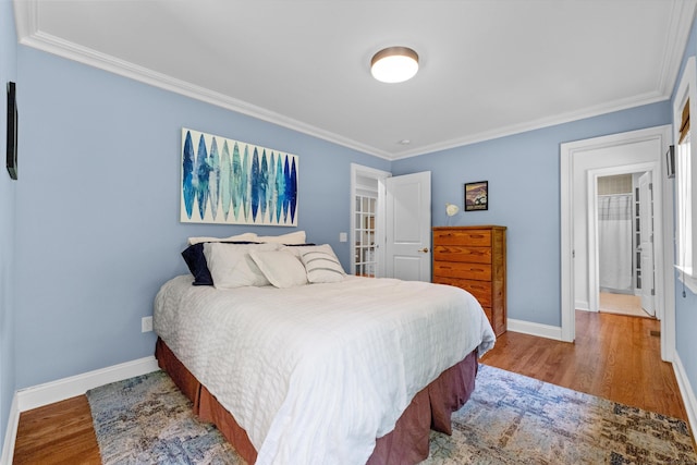 40 Thunder Hill Ln, Ridgefield, CT 06877 - bedroom with ornamental molding, wood finished floors, and baseboards