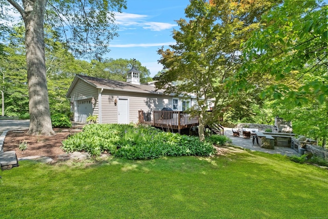 40 Thunder Hill Ln, Ridgefield, CT 06877 - back of property featuring a deck and a lawn