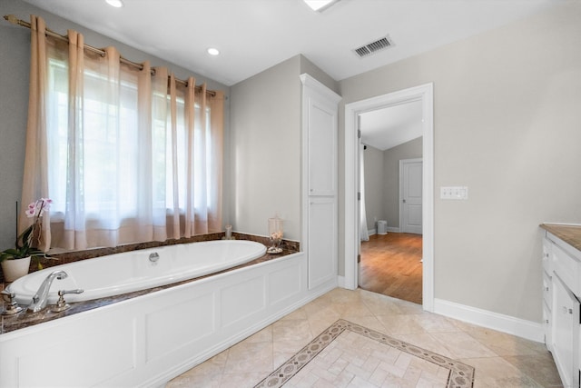 40 Thunder Hill Ln, Ridgefield, CT 06877 - full bathroom featuring a bath, vanity, recessed lighting, tile patterned floors, and inlaid floor details
