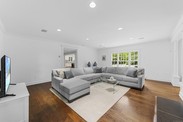 47 Ridgecrest Rd, Stamford, CT 06903 - living room featuring crown molding, ornate columns, hardwood / wood-style flooring, recessed lighting, and baseboards