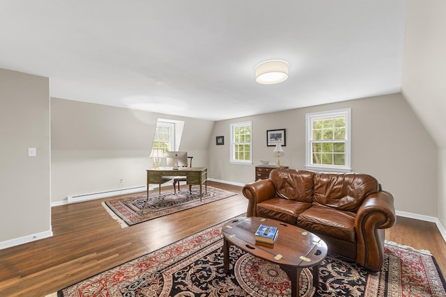 47 Ridgecrest Rd, Stamford, CT 06903 - living area with a baseboard heating unit, wood finished floors, a desk, baseboards, and vaulted ceiling