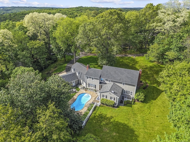 47 Ridgecrest Rd, Stamford, CT 06903 - drone / aerial view of a forest and a pool area