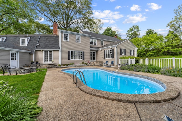 47 Ridgecrest Rd, Stamford, CT 06903 - view of swimming pool with entry steps, a patio, and french doors