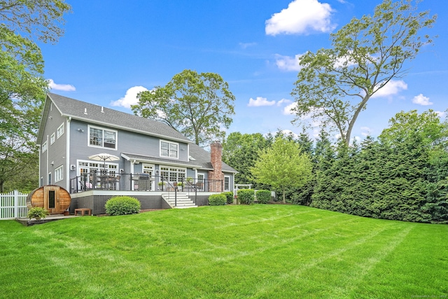 975 Flintlock Rd, Fairfield, CT 06890 - rear view of property featuring a chimney, a deck, and a shingled roof