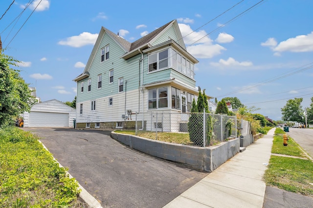 174 Franklin Ave, Stratford, CT 06614 - view of side of home featuring an outbuilding and a detached garage