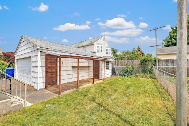 174 Franklin Ave, Stratford, CT 06614 - view of yard featuring an outbuilding and a garage