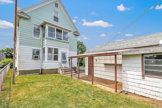 174 Franklin Ave, Stratford, CT 06614 - rear view of property with cooling unit