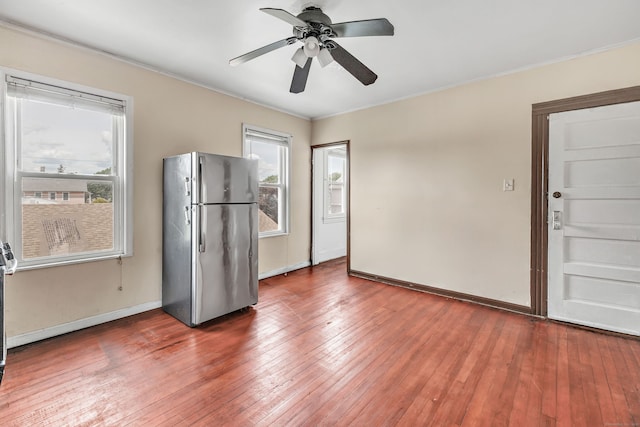 174 Franklin Ave, Stratford, CT 06614 - kitchen with freestanding refrigerator, hardwood / wood-style floors, ceiling fan, and ornamental molding
